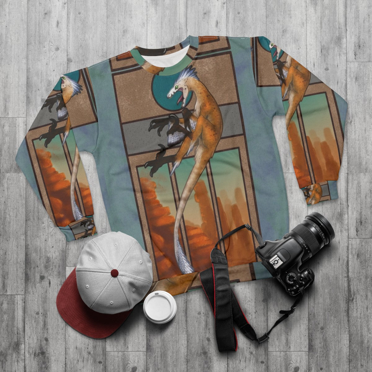 Feathered Velociraptor Dinosaur Sweatshirt - flat lay