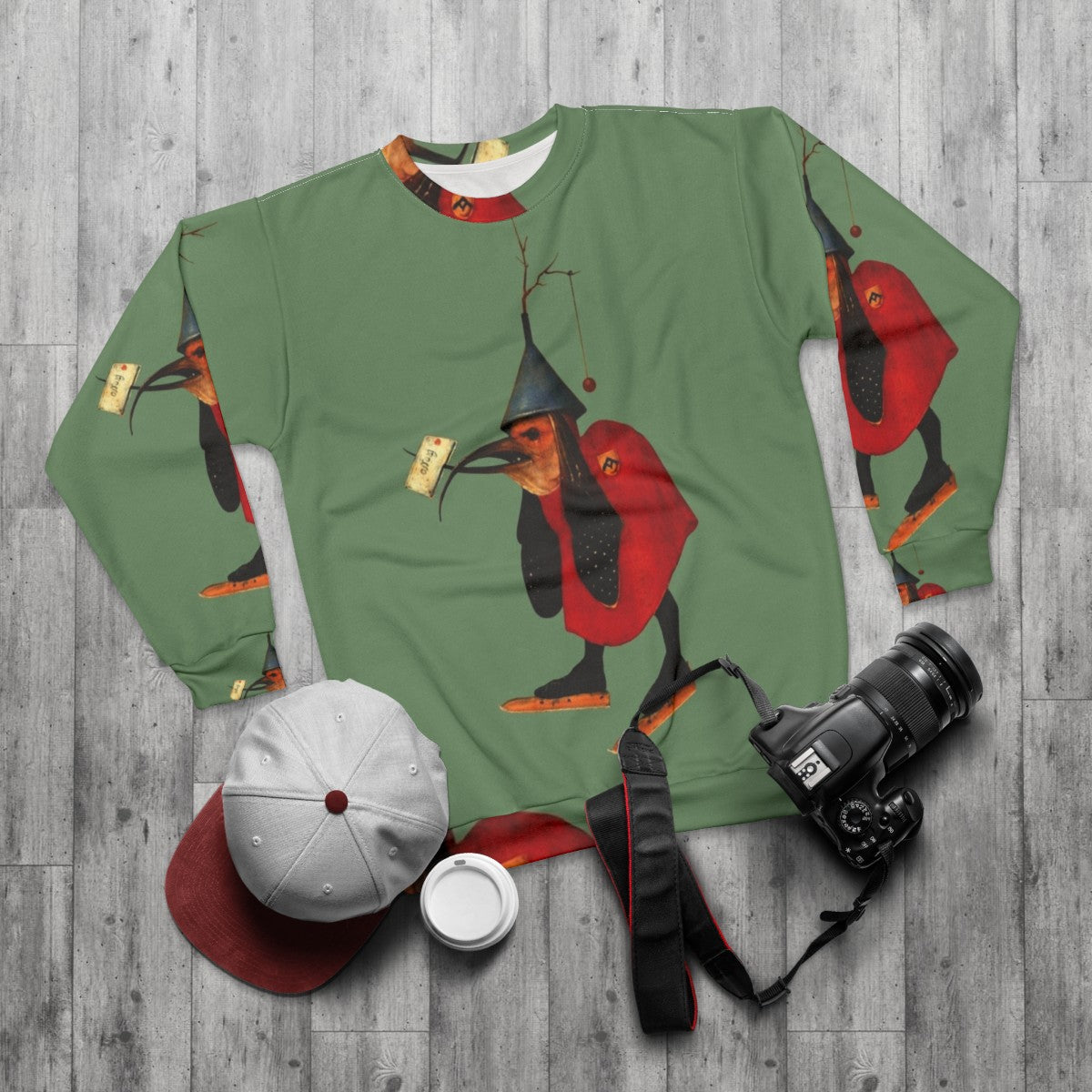 Hieronymus Bosch inspired sweatshirt with bird and letter design - flat lay