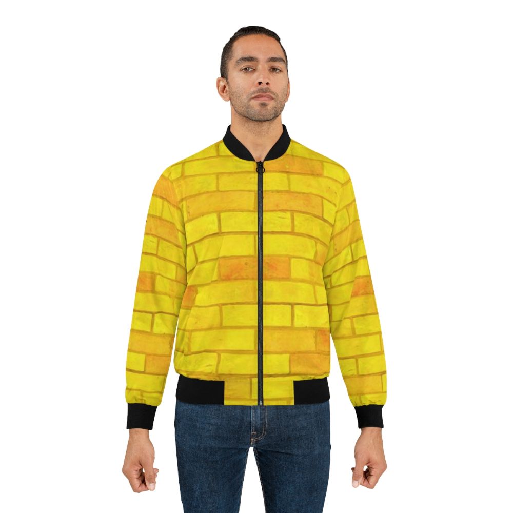 Retro yellow bomber jacket with graphic design elements inspired by The Wizard of Oz - Lifestyle