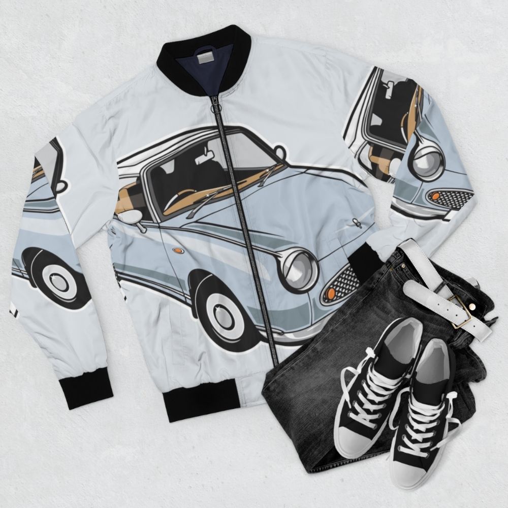 Pale aqua bomber jacket with Nissan Figaro car graphic - Flat lay