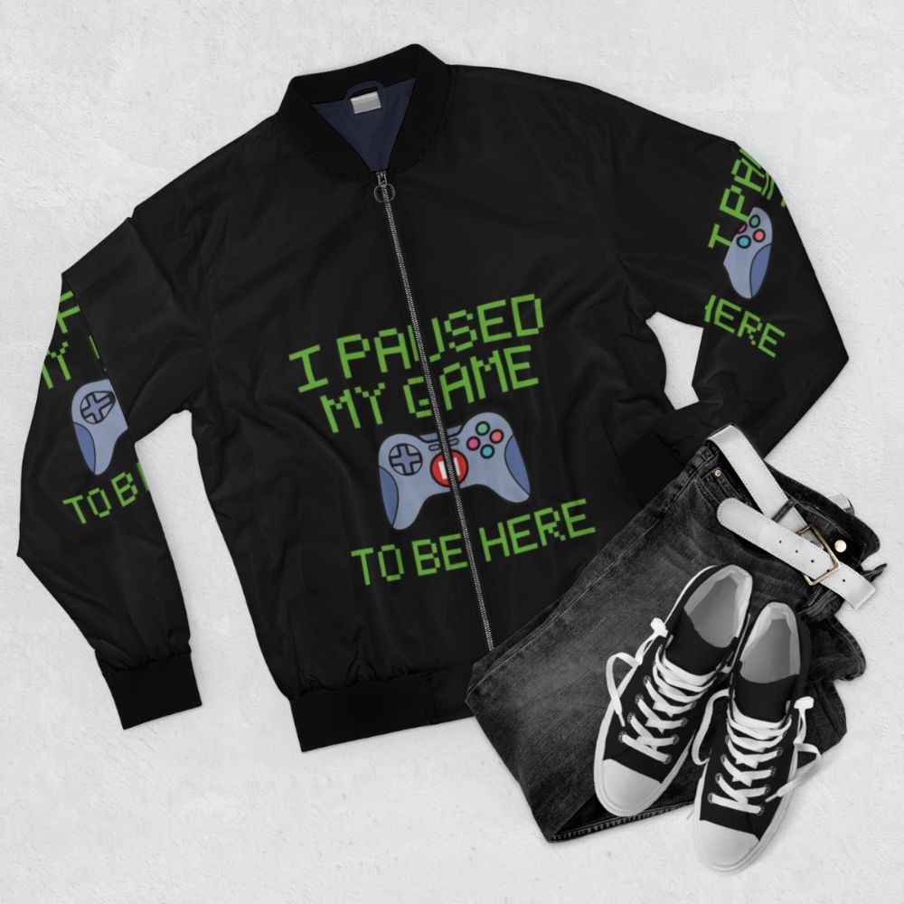 Funny gamer bomber jacket with text "I Paused My Game to Be Here" - Flat lay