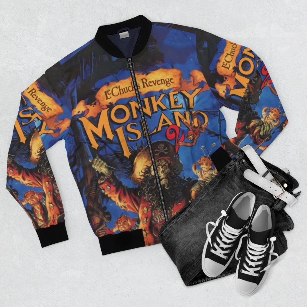 Monkey Island 2 LeChuck's Revenge Bomber Jacket featuring retro video game graphics - Flat lay