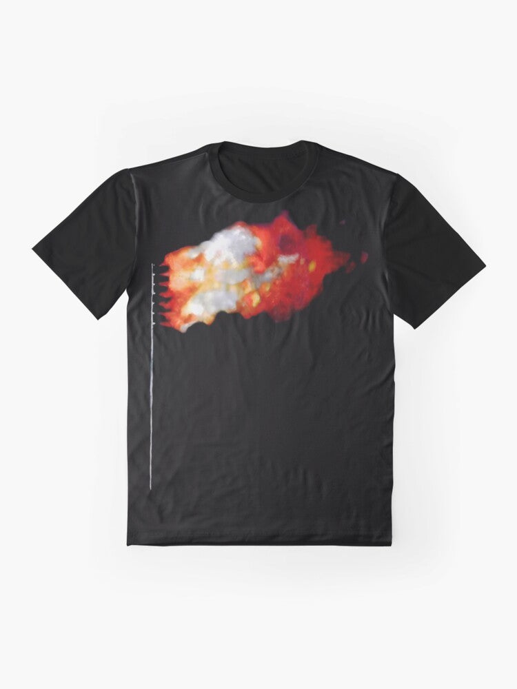 A graphic t-shirt featuring a burning American flag design. - Flat lay