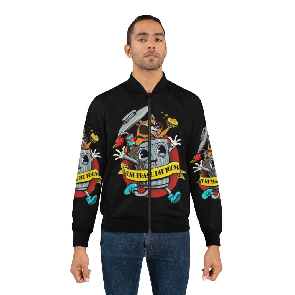 Vintage cartoon "Eat Trash Die Young" bomber jacket with raccoon, trash can, and other trash-themed graphics. - Lifestyle