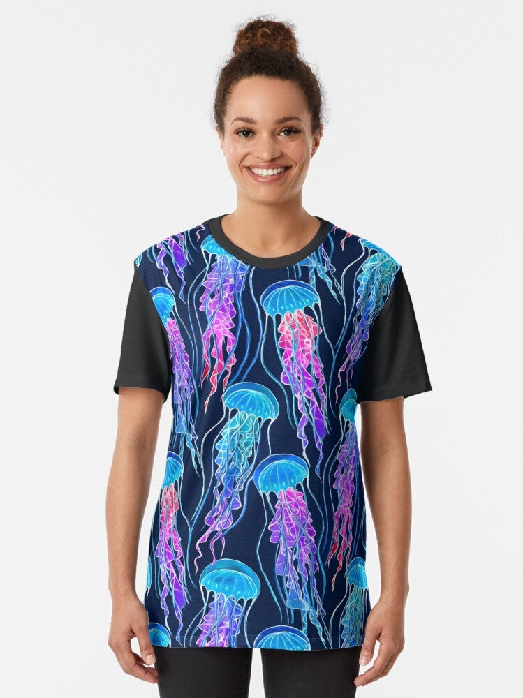 Glowing, bioluminescent jellyfish in a colorful, ombre pattern on a navy blue background - Women