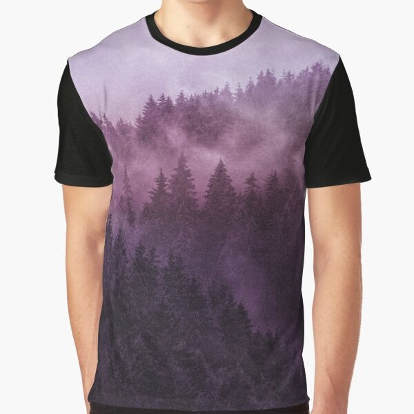 Graphic t-shirt with a design featuring a foggy, misty forest in a wilderness setting