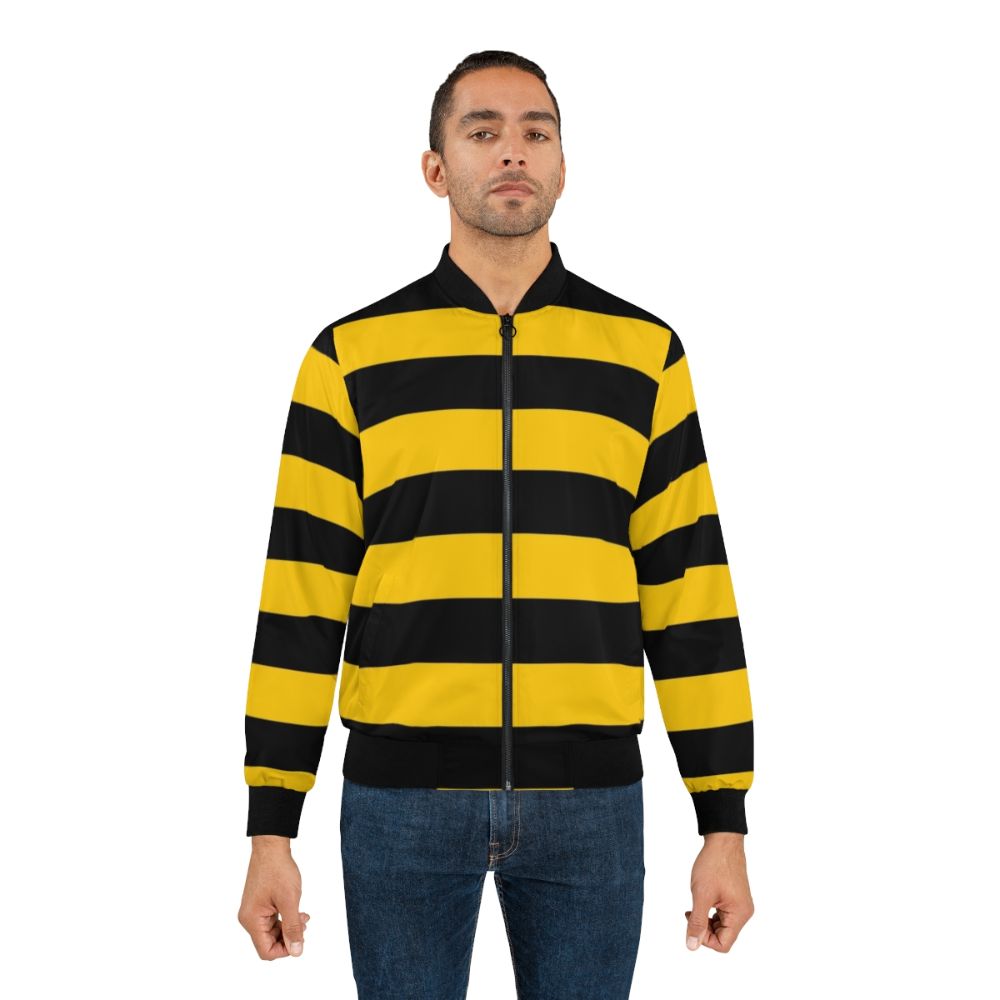 A stylish bomber jacket featuring a bee-inspired design with yellow and black stripes. - Lifestyle