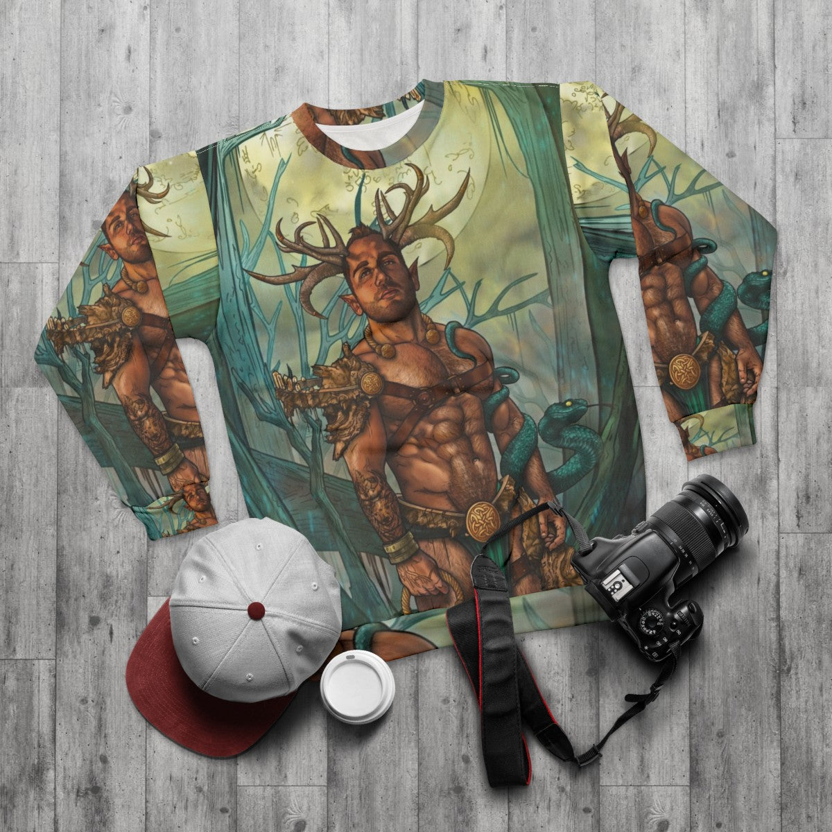 Cernunnos, a mythical pagan satyr figure, featured on a colorful sweatshirt design - flat lay