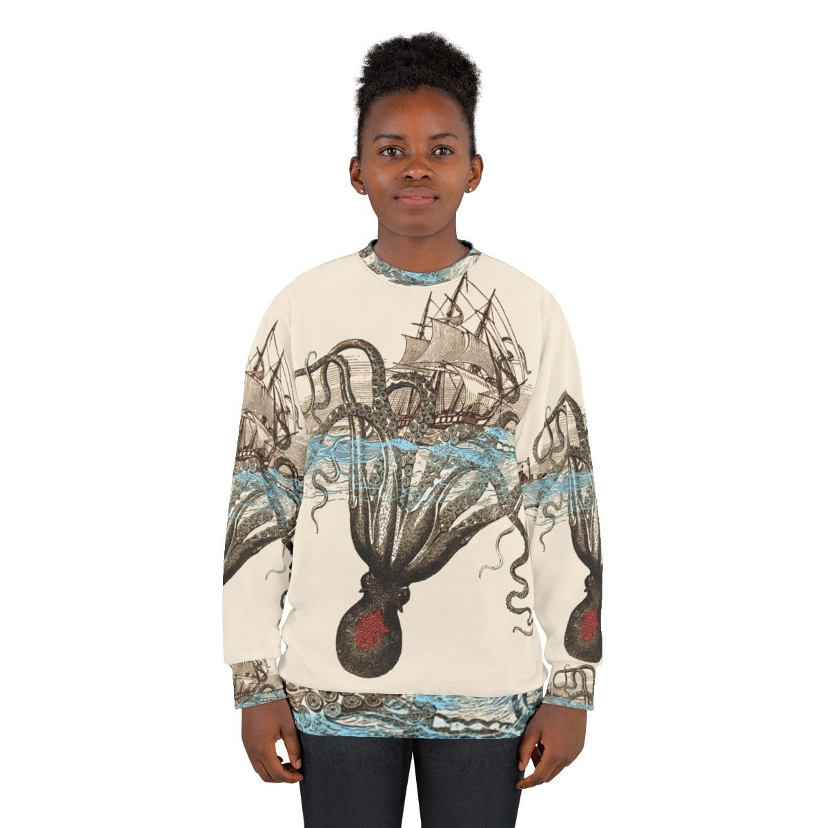 A person wearing a sweatshirt with a kraken design - women