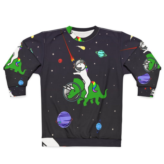 Unicorn riding a triceratops in a space themed design on a sweatshirt