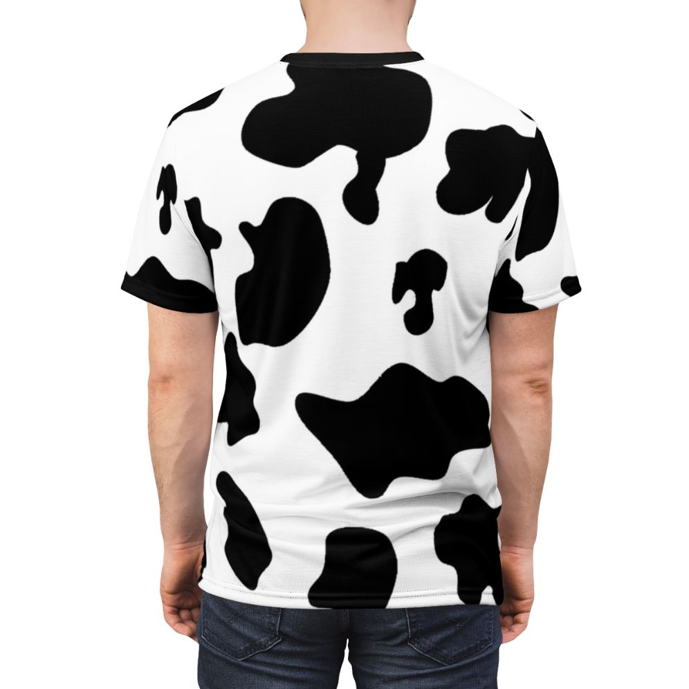 Closeup of a cow pattern animal print t-shirt with a vibrant design - men back