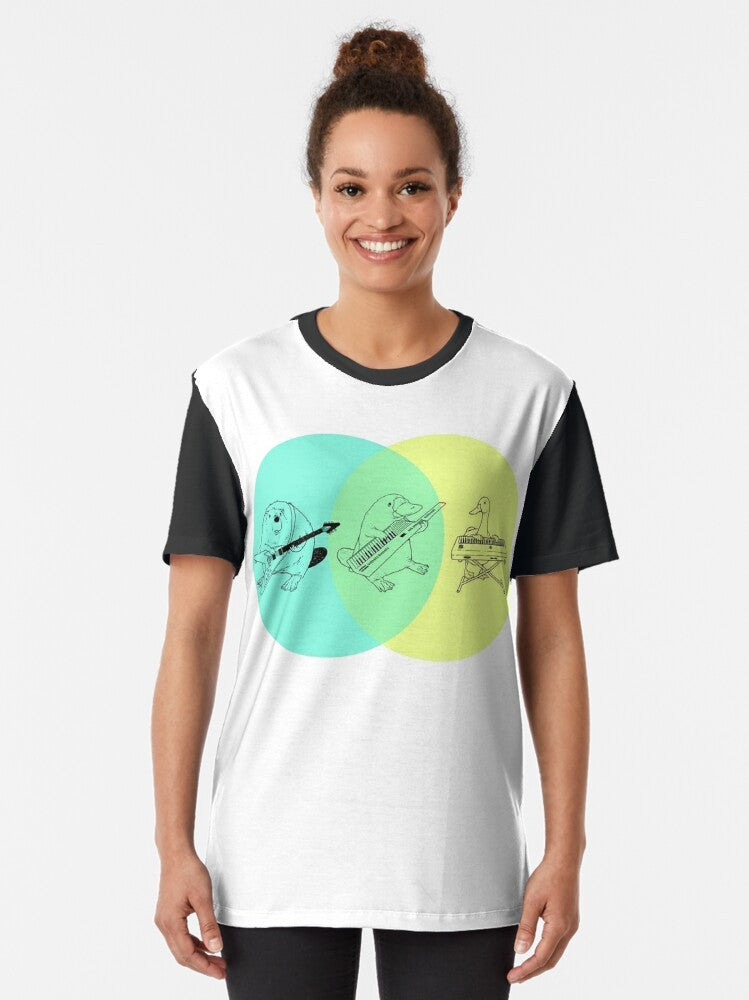 A graphic t-shirt featuring a Venn diagram with a keytar and platypus design, representing a quirky, fun, and hip style. - Women