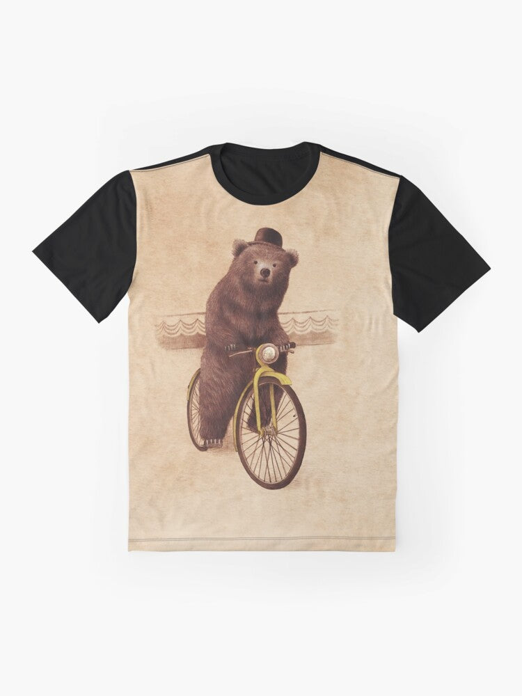 A whimsical graphic t-shirt featuring a vintage-style illustration of a bear riding a bicycle, wearing a bowler hat against a sepia-toned background. - Flat lay