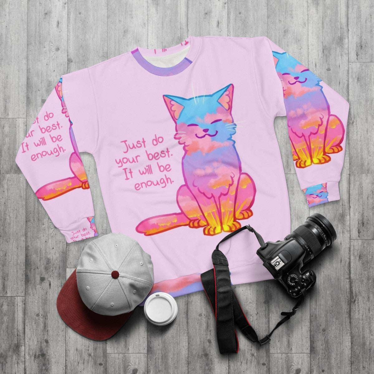 Sunset cat sweatshirt with positive affirmation - flat lay