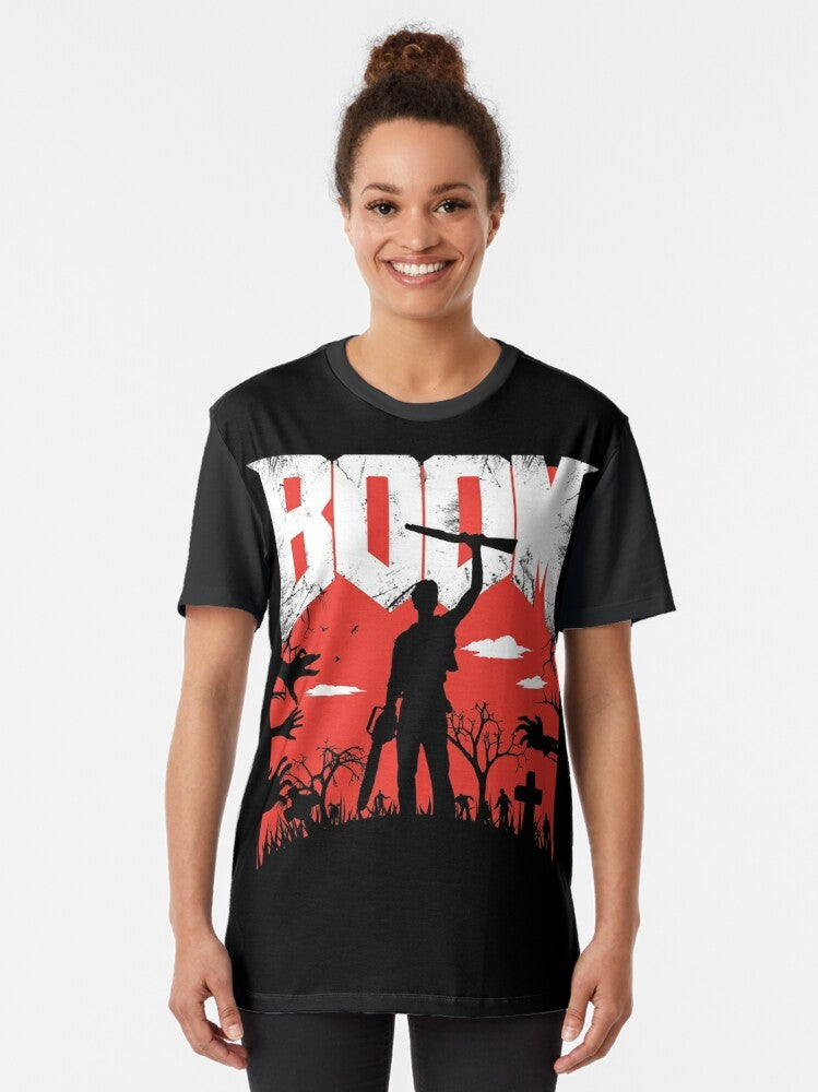 "This is my Boomstick!" Graphic T-Shirt featuring the iconic weapon from the Evil Dead franchise and Bruce Campbell's character Ash. - Women