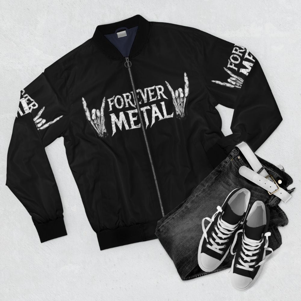 Metalhead wearing a forever metal bomber jacket with heavy metal-inspired design - Flat lay