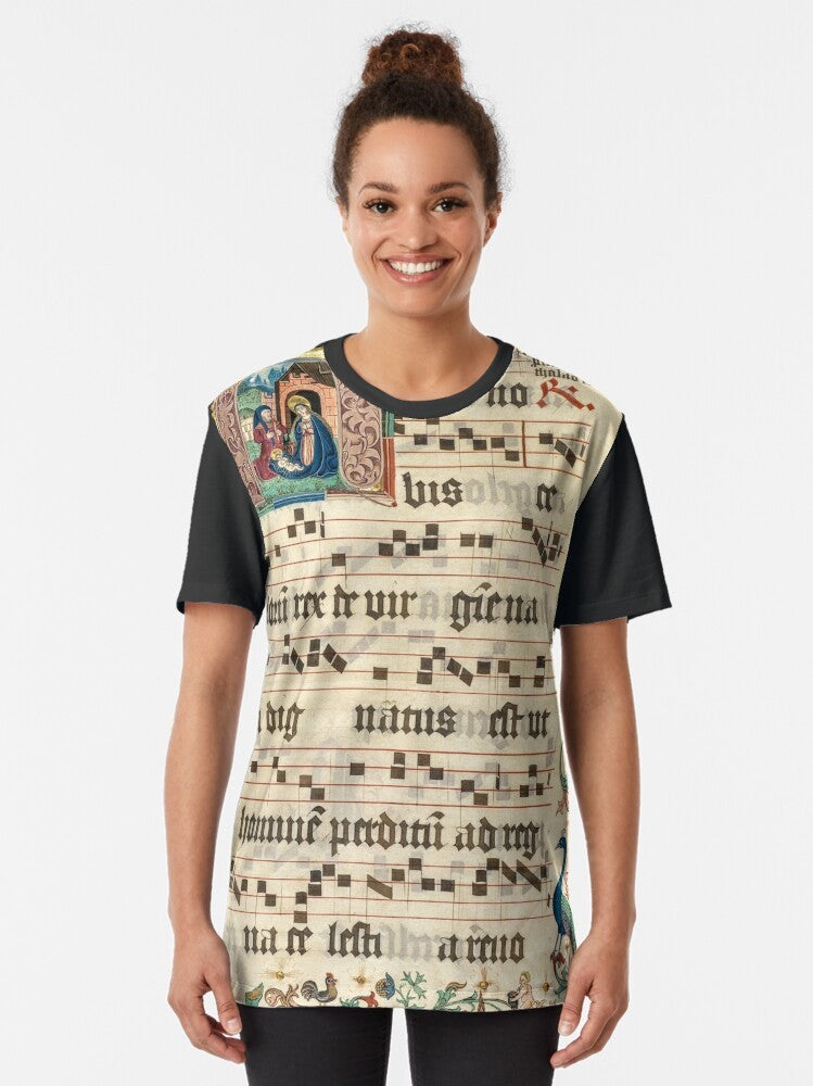 Graphic t-shirt featuring an intricate illuminated manuscript design with religious art and gothic style - Women