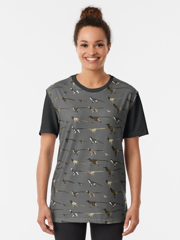 Graphic t-shirt featuring a velociraptor dromaeosaurid dinosaur design - Women