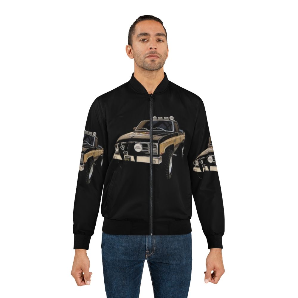 A bomber jacket inspired by the TV series "The Fall Guy" featuring the GMC Sierra Grande truck - Lifestyle