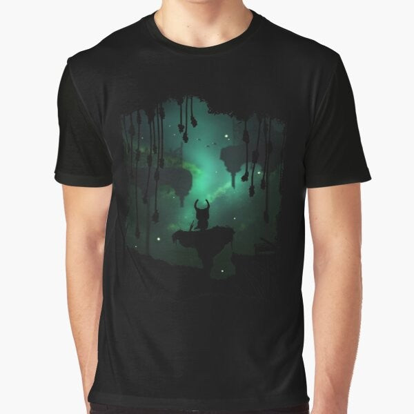 A graphic t-shirt featuring the Greenpath environment from the Hollow Knight game, with leafy elements, birds, and a peaceful nature theme.