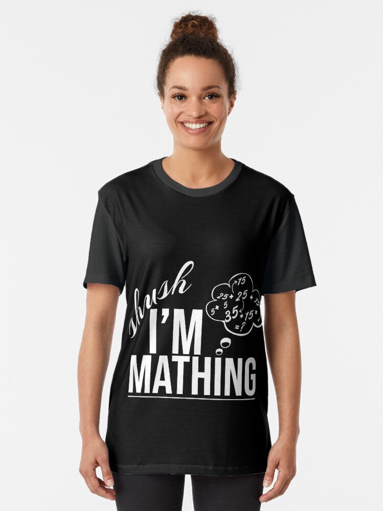 Mathing graphic t-shirt with a trendy geometric pattern design - Women