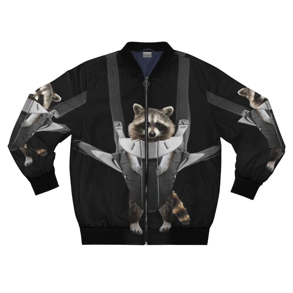 A gray and white bomber jacket with the text "Raccoon Whisperer" printed on it, featuring a playful raccoon design.