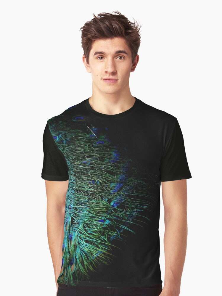 Graphic t-shirt design featuring abstract peacock feathers on a black background, modern aesthetic. - Men