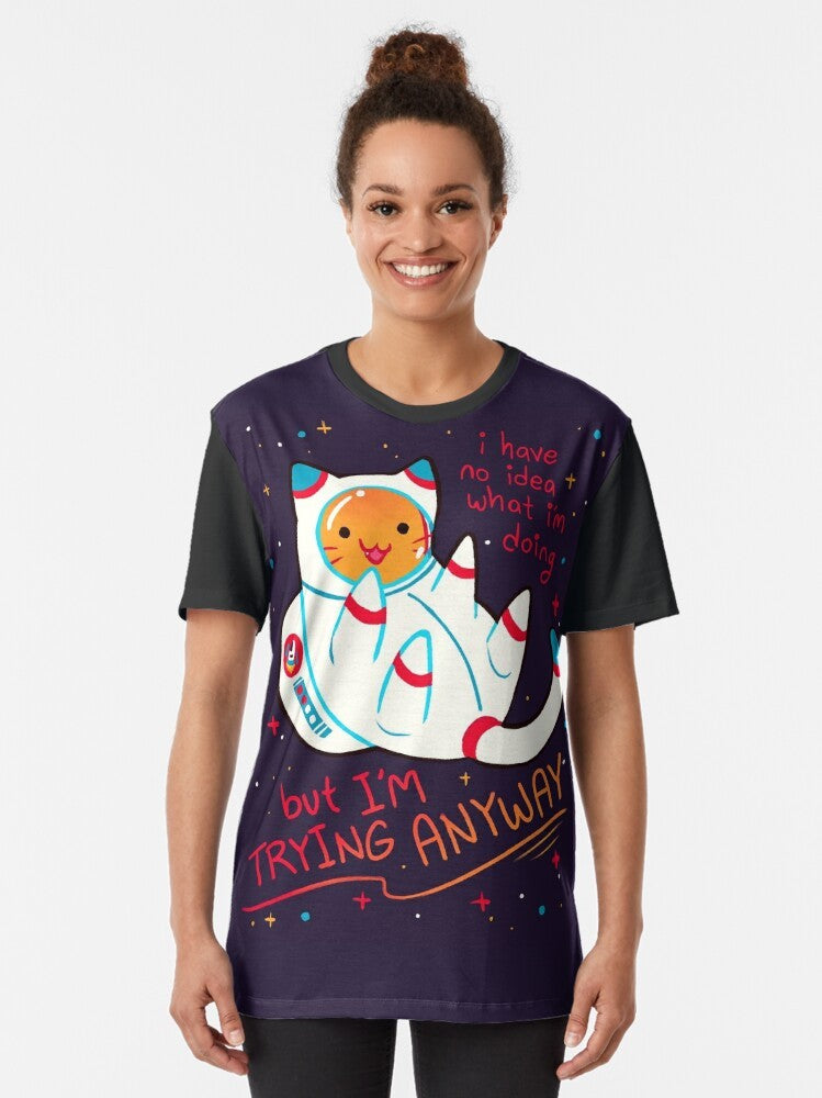 Catstronaut graphic t-shirt with the text "I'M TRYING ANYWAY" and stars in the background - Women