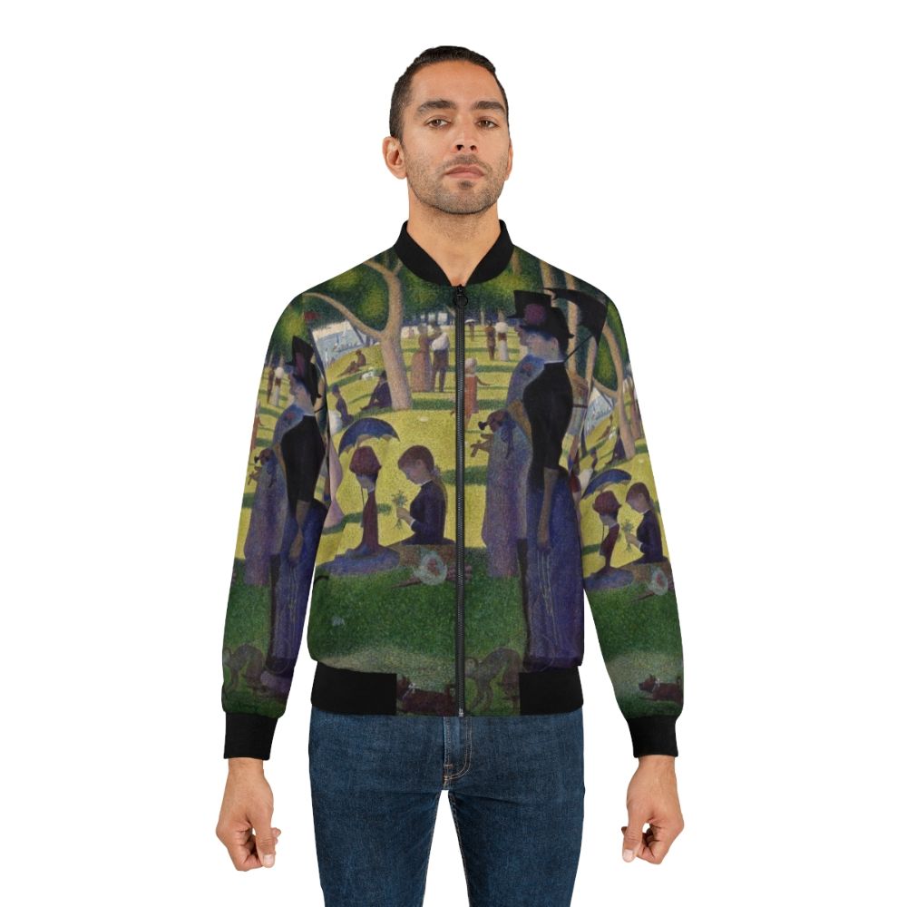 A bomber jacket featuring a pointillist design inspired by Georges Seurat's painting 'Sunday Afternoon on La Grande Jatte' - Lifestyle