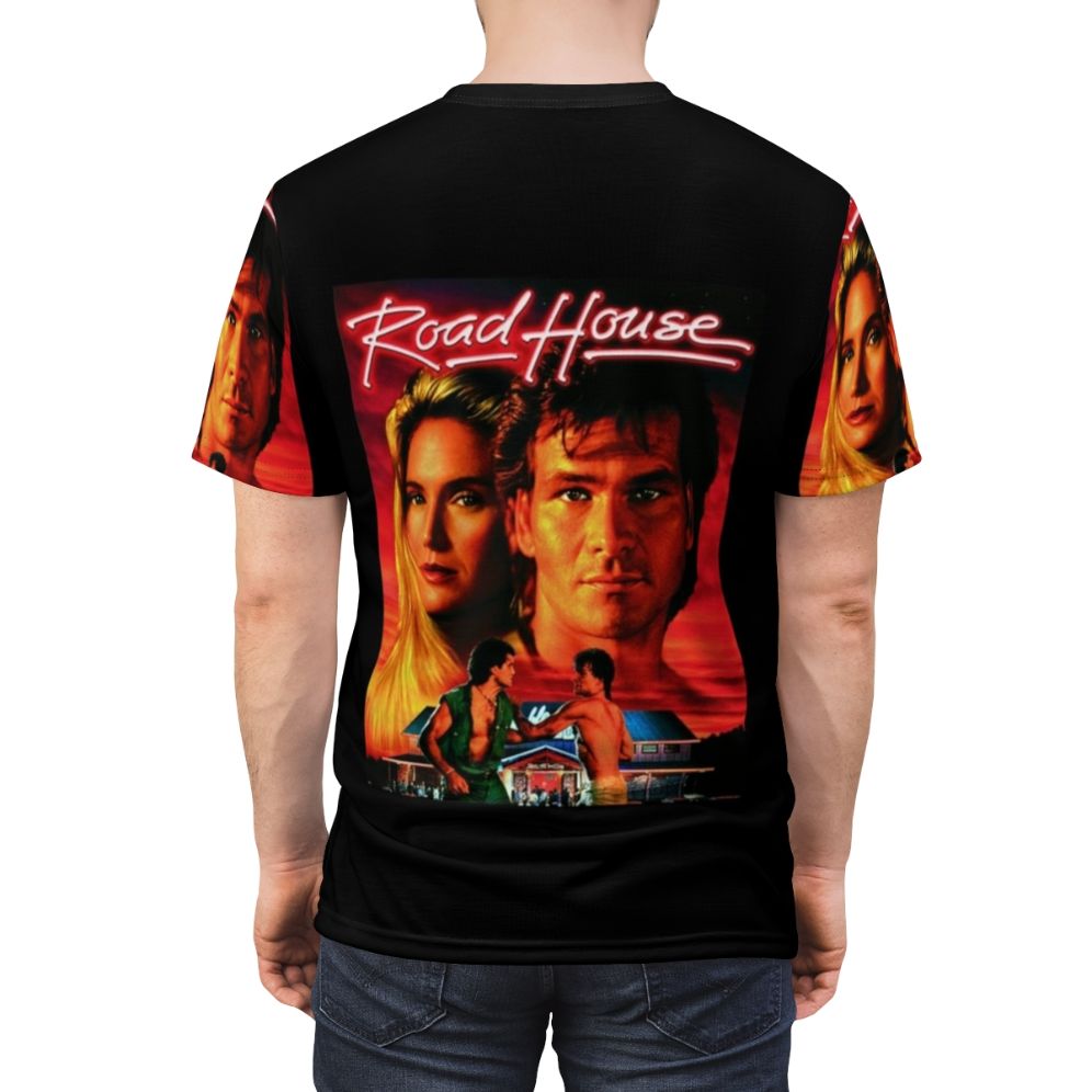 Retro-style t-shirt featuring the iconic "Roadhouse" movie logo and Patrick Swayze - men back