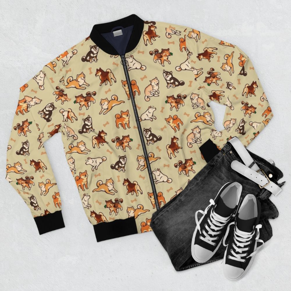 A cozy and stylish bomber jacket featuring a cute shiba inu dog pattern. - Flat lay