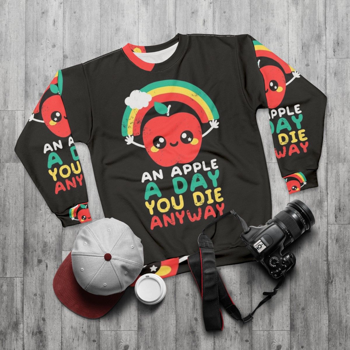 Sarcastic "An Apple a Day" Dark Humor Sweatshirt with Kawaii Rainbow Apple - flat lay