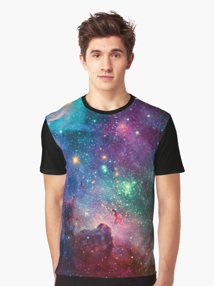 A colorful graphic t-shirt featuring a galaxy design with planets, stars, and cosmic elements. - Men