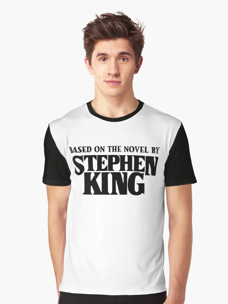 A graphic t-shirt featuring a design inspired by Stephen King's "The Dark Tower" book series. - Men