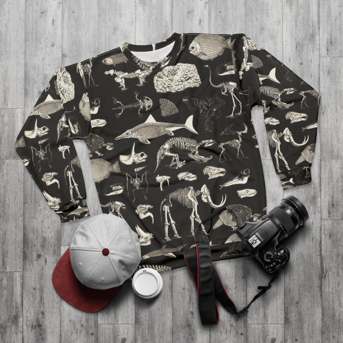 Paleontology Illustration Sweatshirt featuring fossils, dinosaurs, and skeletons - flat lay