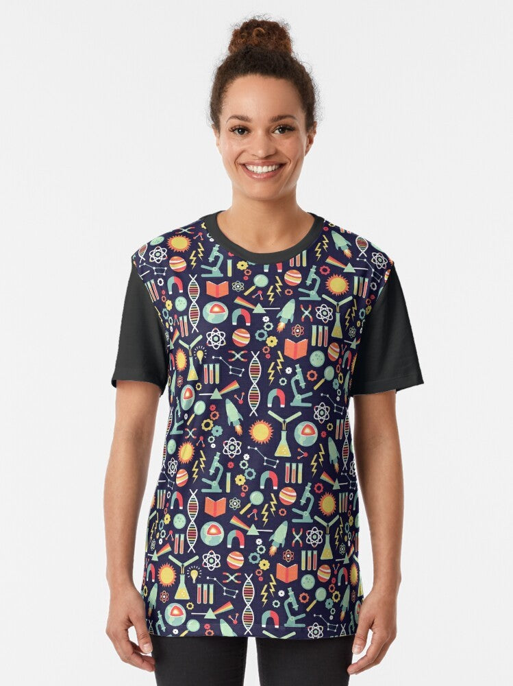 Science Studies Graphic T-Shirt featuring a colorful damask pattern with laboratory equipment symbols like beakers and test tubes. - Women