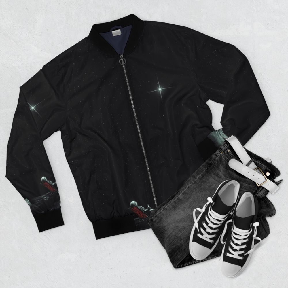 Stylish bomber jacket with a space-themed abstract design featuring stars, planets, and cosmic elements. - Flat lay