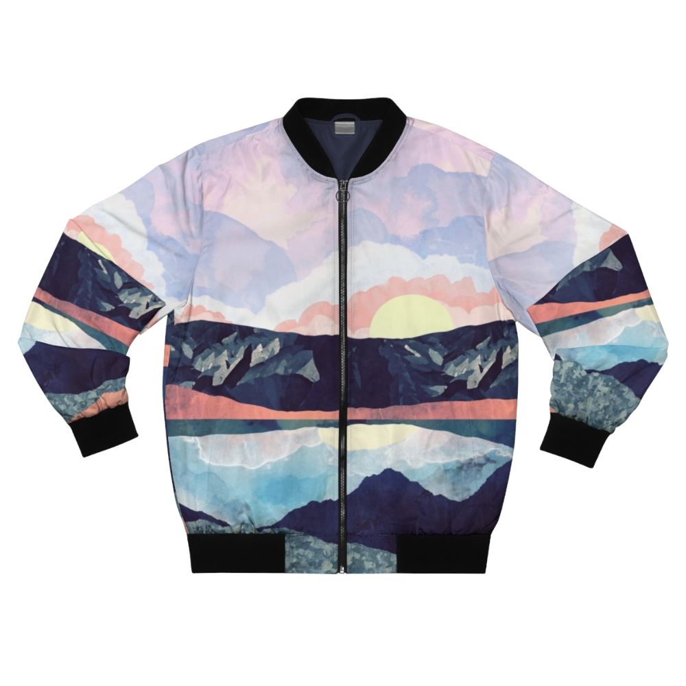 A bomber jacket with a serene lake reflection landscape design