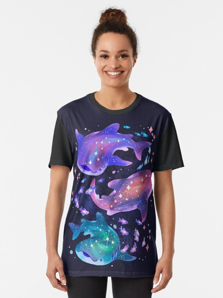 A cosmic-themed t-shirt design featuring a purple whale shark swimming among the stars. - Women