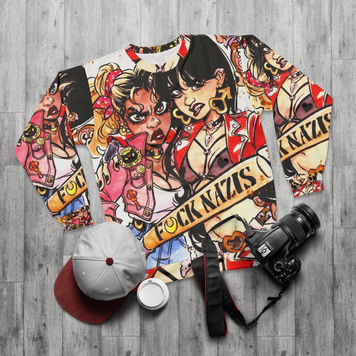 Watercolor art of magical girl superheroes on a sweatshirt - flat lay