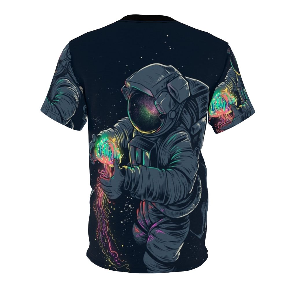 Model wearing a t-shirt featuring a colorful, intergalactic jellyfish design against a starry space backdrop. - Back