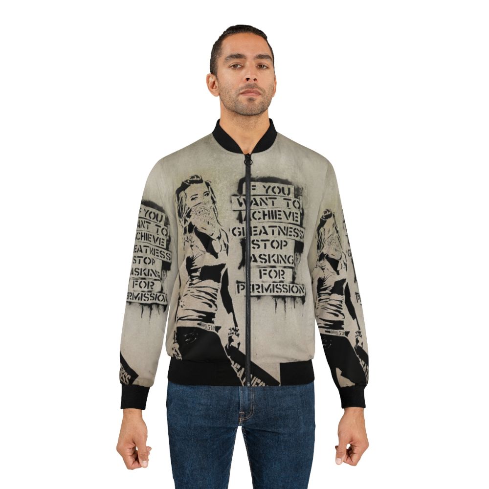 Banksy graffiti-inspired bomber jacket with motivational quote "If You Want to Achieve Greatness" - Lifestyle