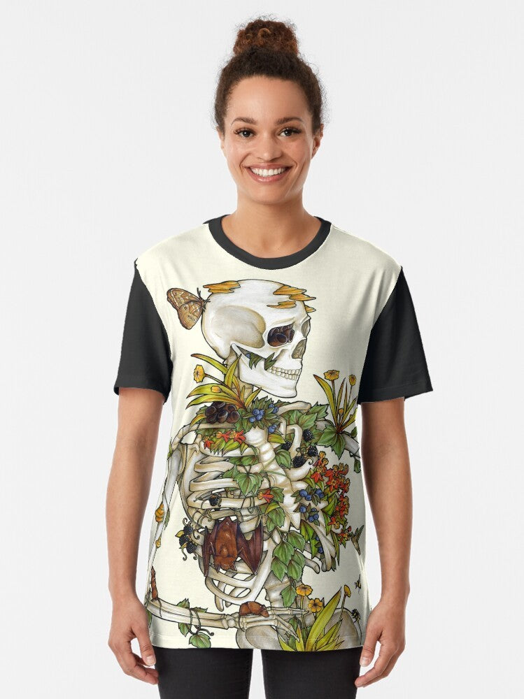 Bones and Botany Graphic T-Shirt featuring a skeleton design with plants, animals, and nature elements - Women