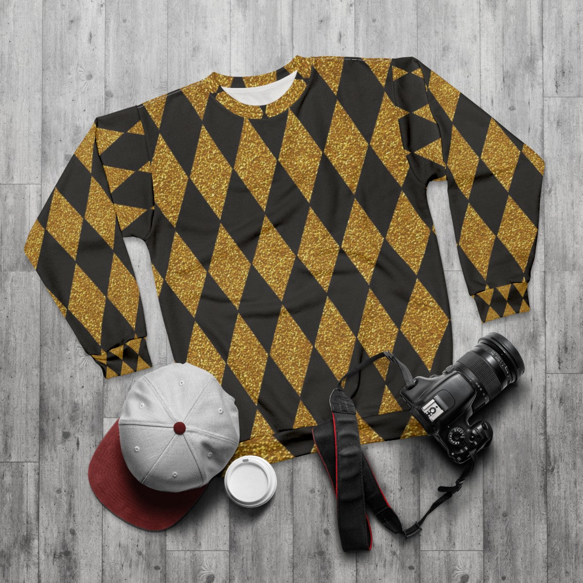 Black and gold harlequin pattern sweatshirt - flat lay