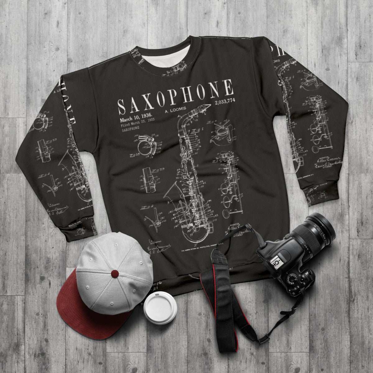 Vintage saxophone patent drawing print on sweatshirt - flat lay