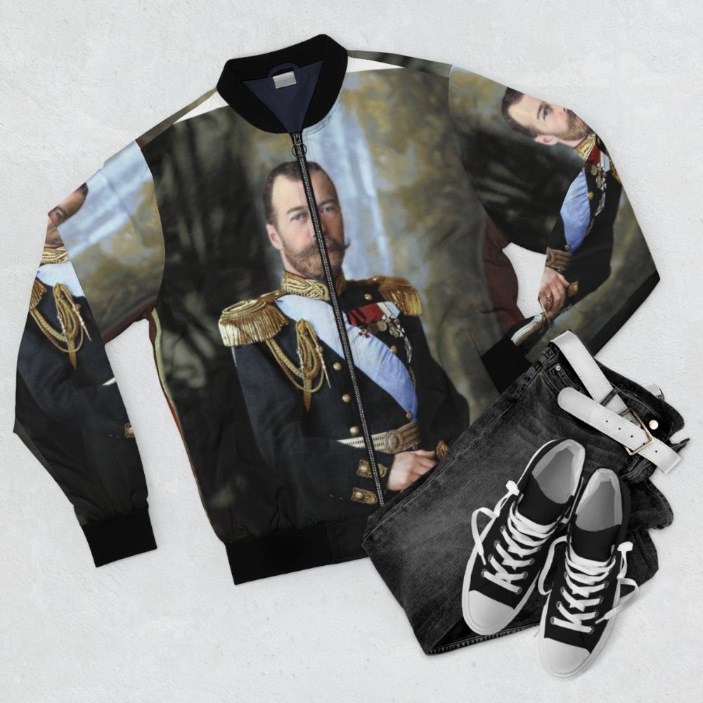 Tsar Nicholas II of Russia portrait printed on a black bomber jacket - Flat lay