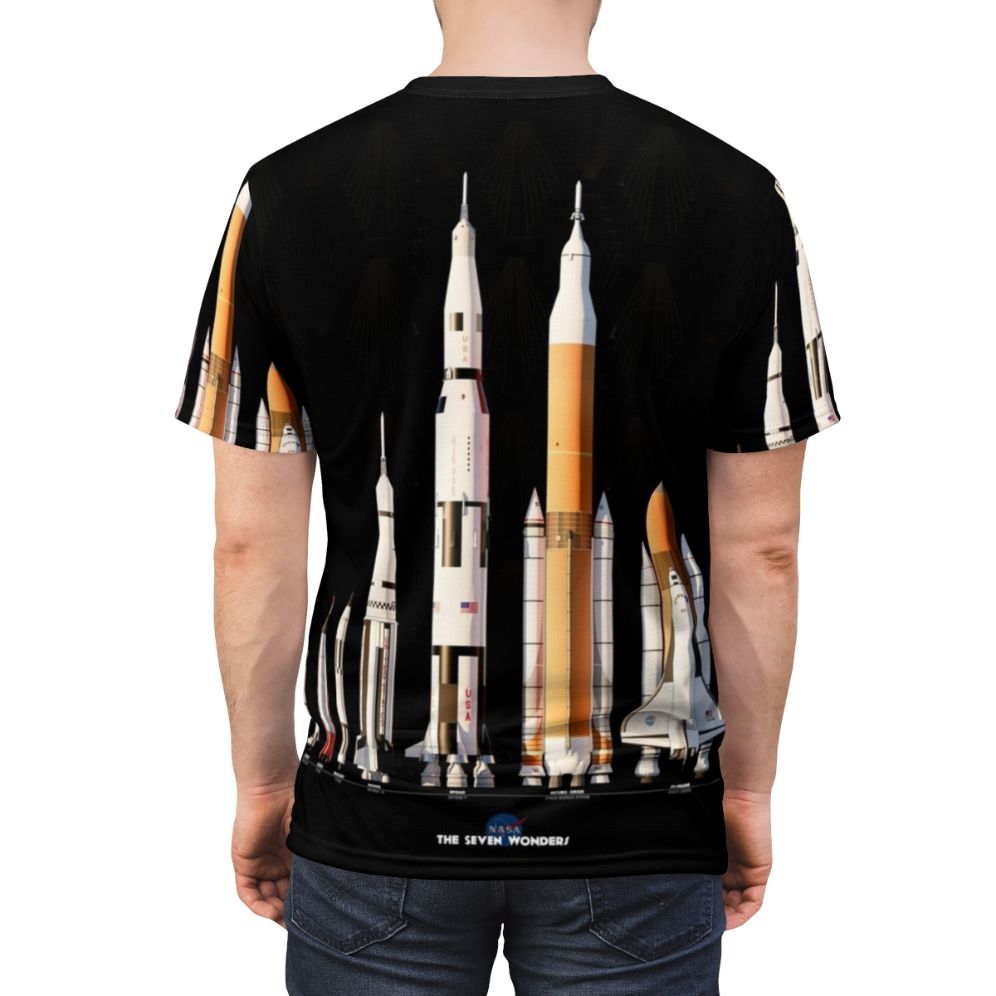 Black t-shirt with a graphic design featuring various NASA rockets and spacecraft on a dark background - men back