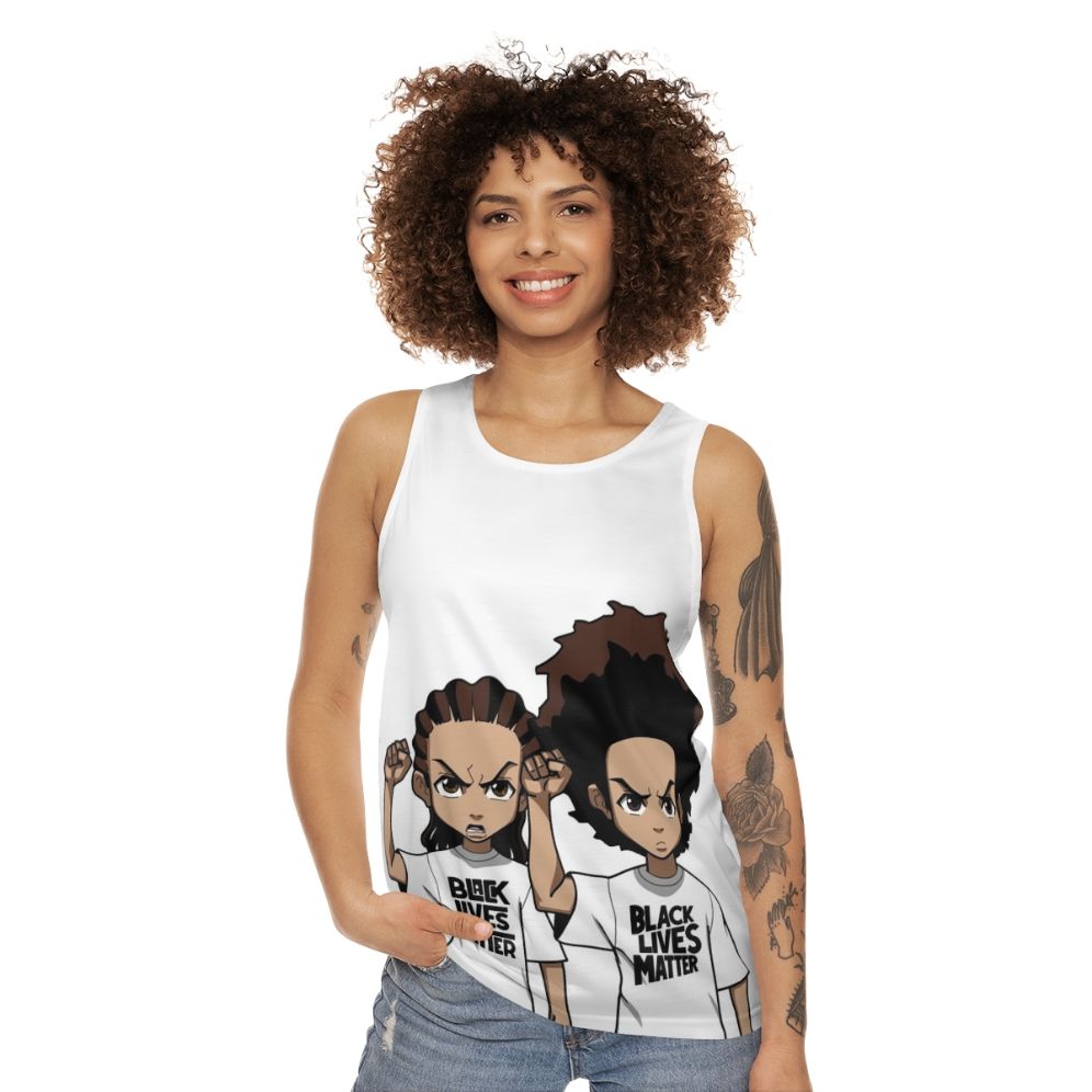 Riley and Huey Freeman Protesting Black Power Fist Unisex Tank Top - women