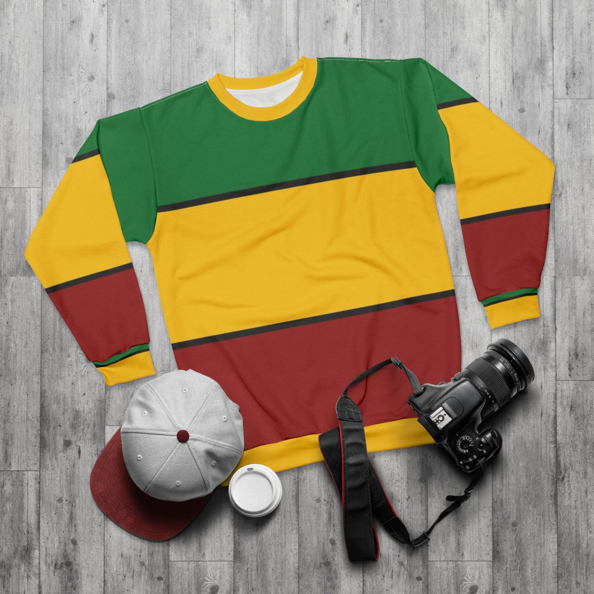 Rasta stripes sweatshirt featuring vibrant red, gold, and green colors - flat lay