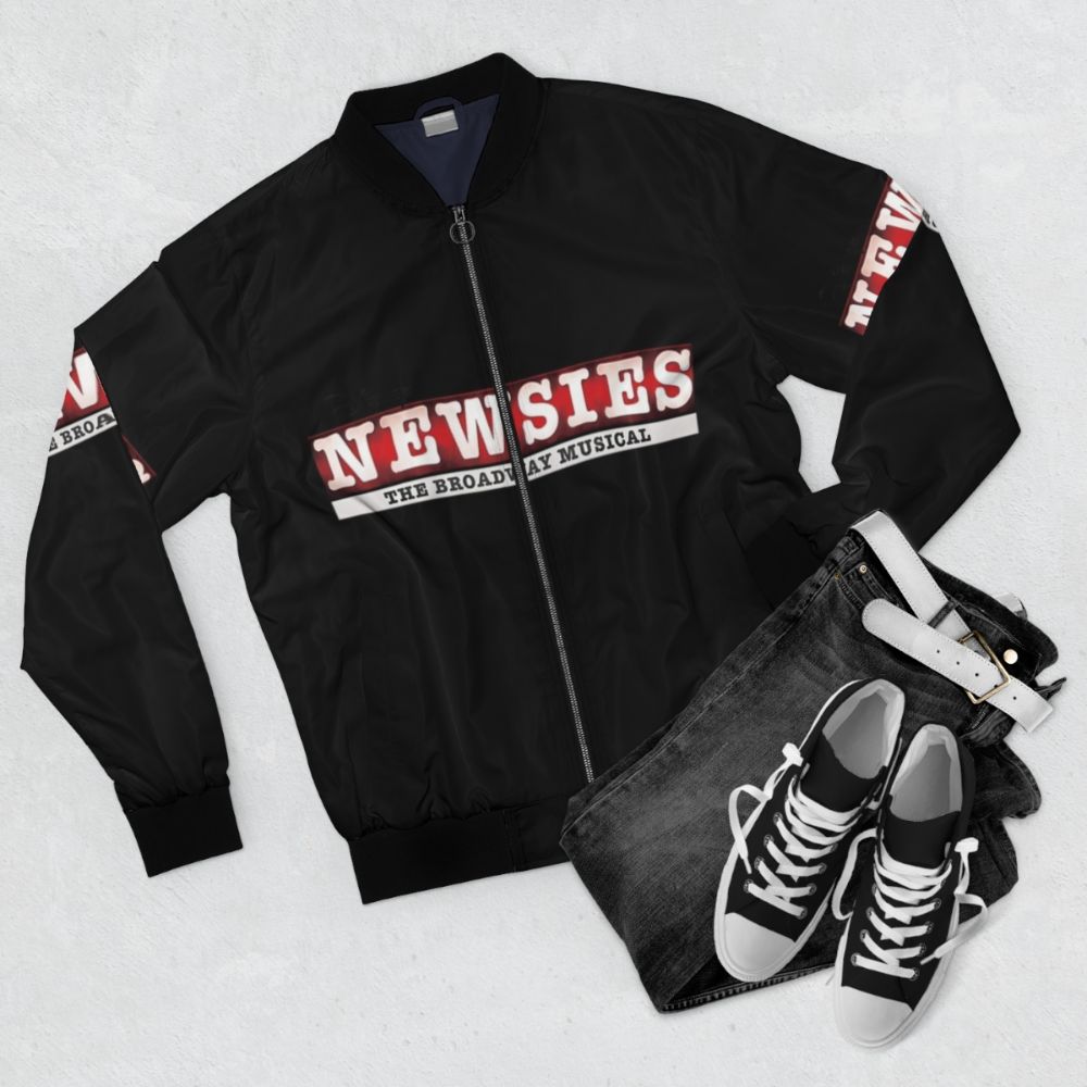 Newsies Broadway Logo Bomber Jacket featuring the iconic Newsies musical logo - Flat lay